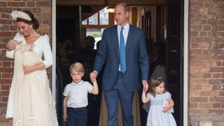 LONDON, ENGLAND - JULY 09: Catherine Duchess of Cambridge and Prince William, Duke of Cambridge with their children Prince George, Princess Charlotte and Prince Louis after Prince Louis' christening at St James's Palace on July 09, 2018 in London, England.