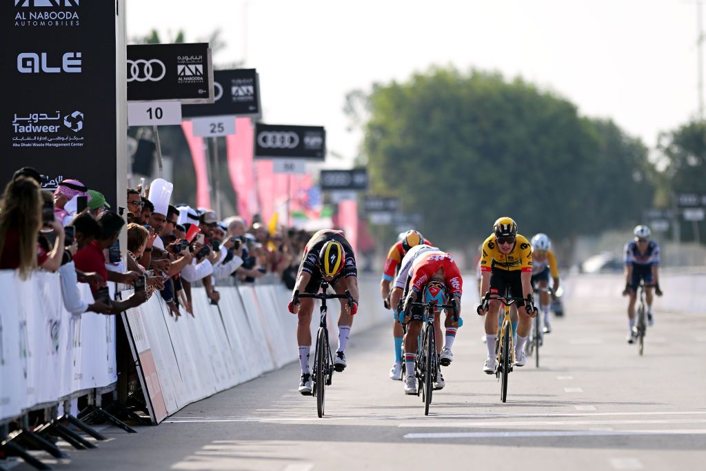 AL MIRFA UNITED ARAB EMIRATES FEBRUARY 20 LR Tim Merlier of Belgium and Team Soudal QuickStep Caleb Ewan of Australia and Team Lotto Dstny and Olav Kooij of The Netherlands and Team JumboVisma sprint to win during the 5th UAE Tour 2023 Stage 1 a 151km stage from Al Dhafra Castle to Al Mirfa UAETour on February 20 2023 in Al Mirfa United Arab Emirates Photo by Dario BelingheriGetty Images