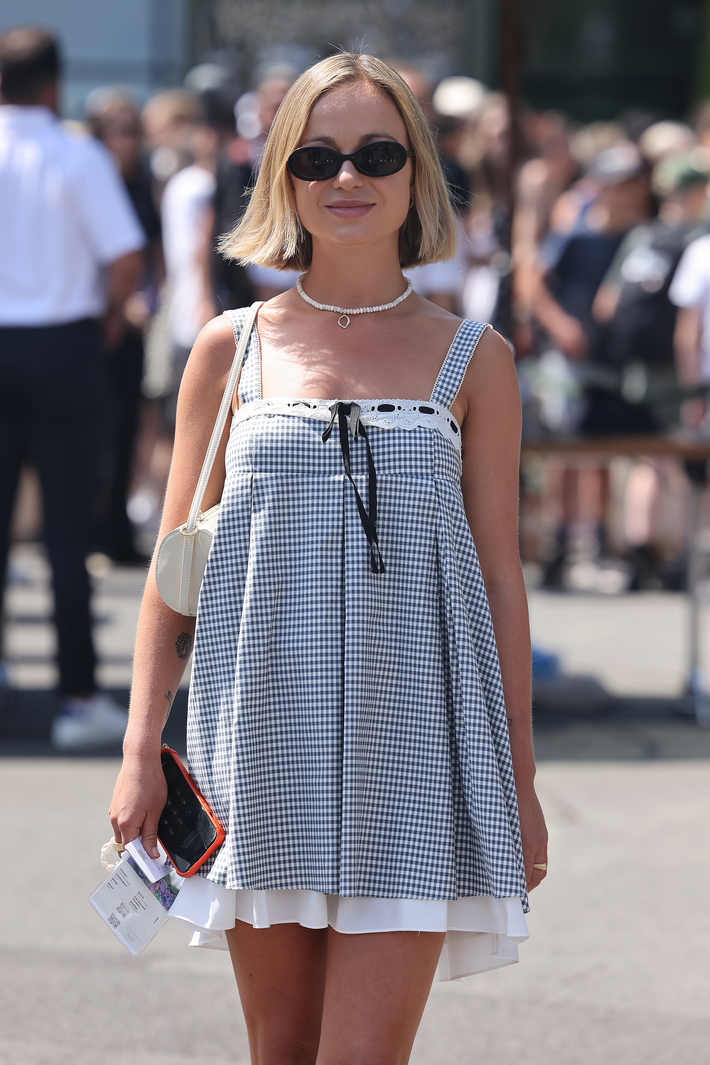 Lady Amelia Windsor wears a gingham dress at Wimbledon.