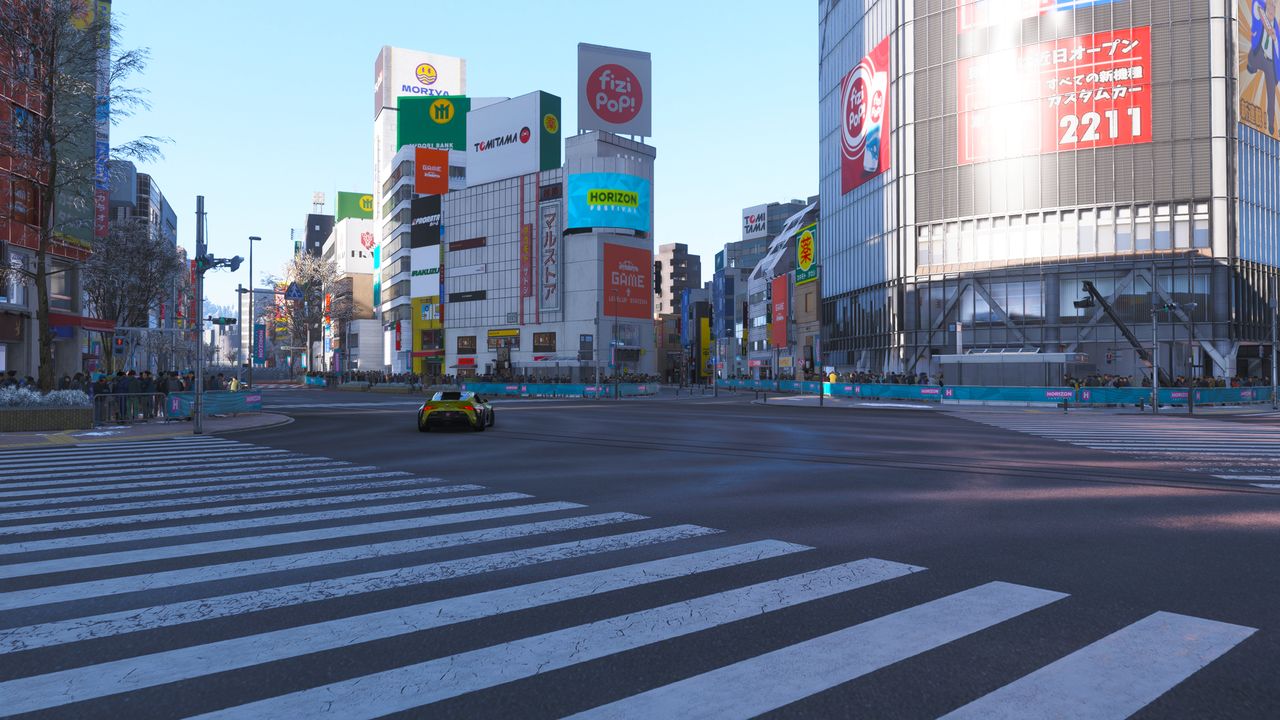 Forza Horizon 6 Shibuya Crossing Tokyo Drift: A yellow Formula Drift driving through the iconic Shibuya Crossing.