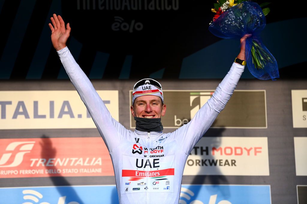 FERMO ITALY MARCH 11 Tadej Pogacar of Slovenia and UAE Team Emirates celebrates at podium as White Best Young Rider Jersey winner during the 57th TirrenoAdriatico 2022 Stage 5 a 155km stage from Sefro to Fermo 317m TirrenoAdriatico WorldTour on March 11 2022 in Fermo Italy Photo by Tim de WaeleGetty Images