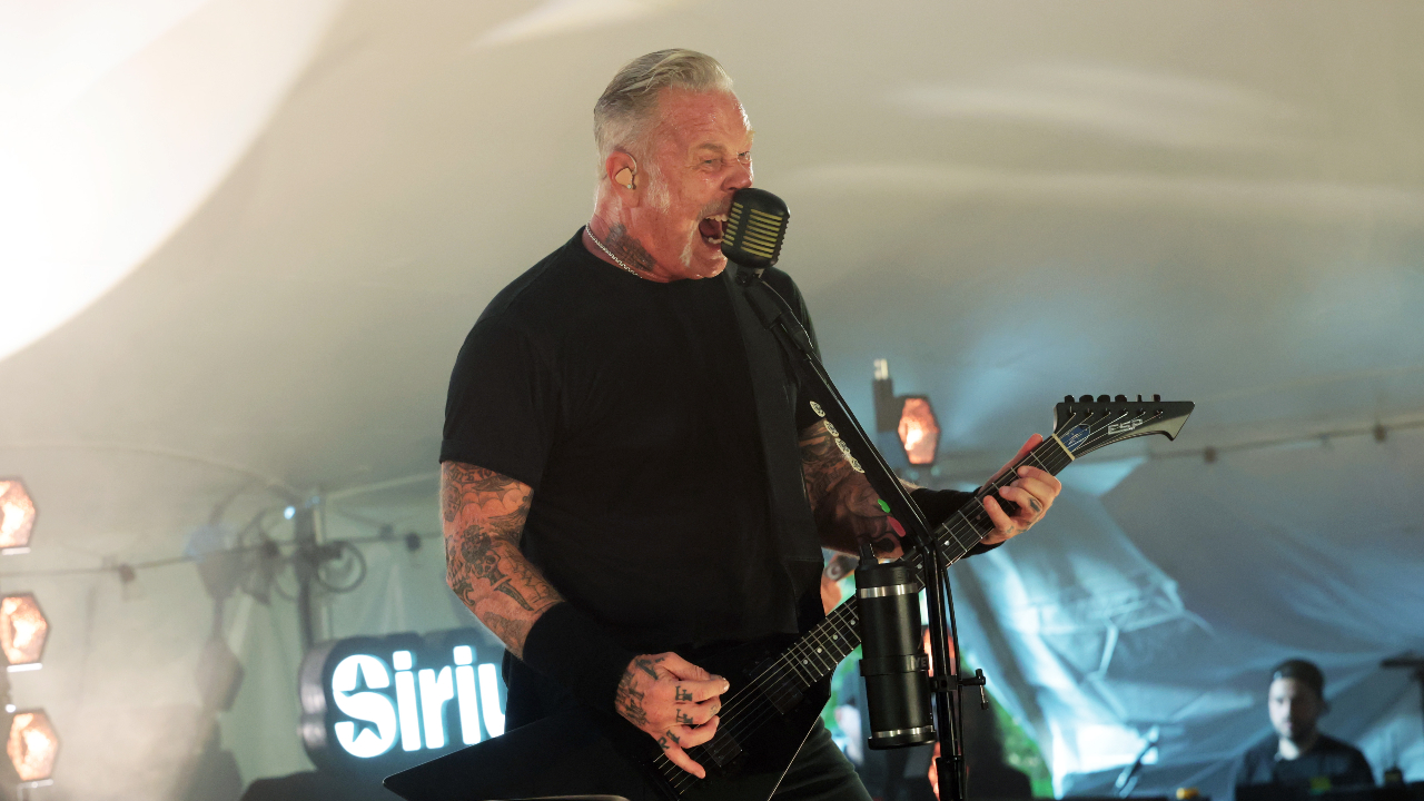 James Hetfield roaring into a microphone