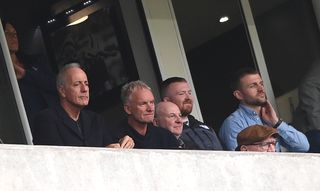 Sting, second from left, watches Newcastle against Tottenham at St. James' Park in April 2023.