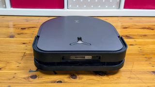 Ecovacs X5 Pro Omni on a polished wooden floor