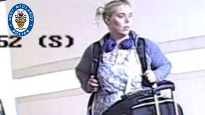 A CCTV still of Aimee Betro with a backpack and a wheelie suitcase