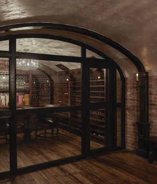 Basement wine cellar with glass door