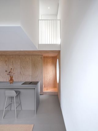 Nest house by i29 timber clad kitchen interior