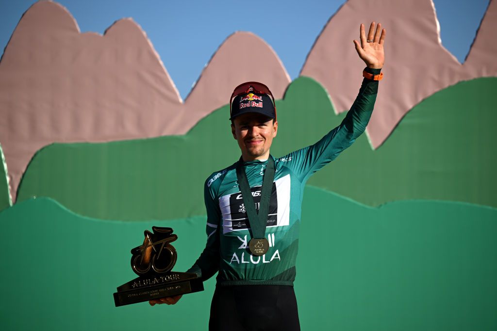 ALULA CAMEL CUP TRACK SAUDI ARABIA FEBRUARY 01 Tom Pidcock of The United Kingdom and Q365 Pro Cycling Team Green Leader Jersey celebrates at podium final overall race winner during the 5th AlUla Tour 2025 Stage 5 a 1696km stage from AlUla Camel Cup Track to AlUla Camel Cup Track on February 01 2025 in AlUla Saudi Arabia Photo by Szymon GruchalskiGetty Images