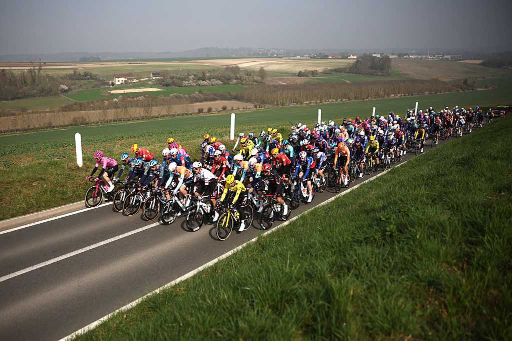 The pack rides during the 1st stage of the Paris-Nice cycling race, 170.9 km between Ach&amp;egrave;res and Carri&amp;egrave;res-sous-Poissy, on March 8, 2026. (Photo by Anne-Christine POUJOULAT / AFP)
