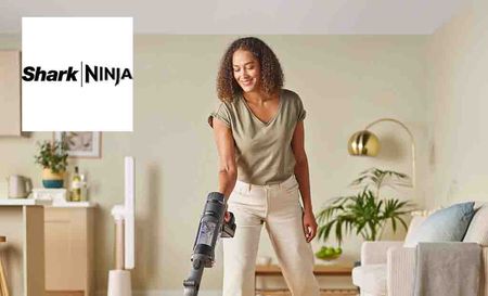 shark and ninja logo top left with a woman hoovering