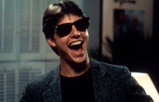 Tom Cruise laughs in a scene from the film 'Risky Business', 1983.