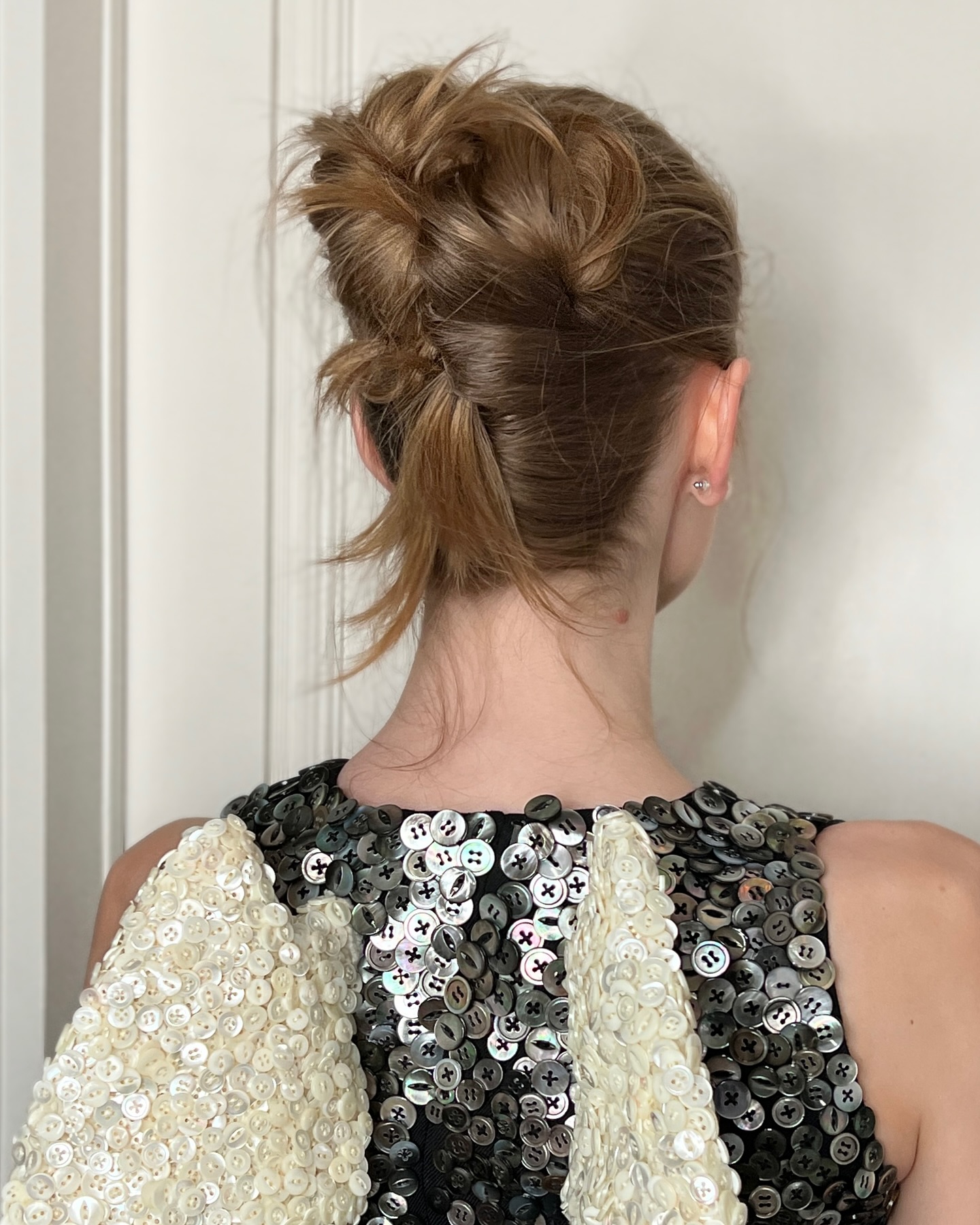 Hunter Schafer with twisted hairstyle