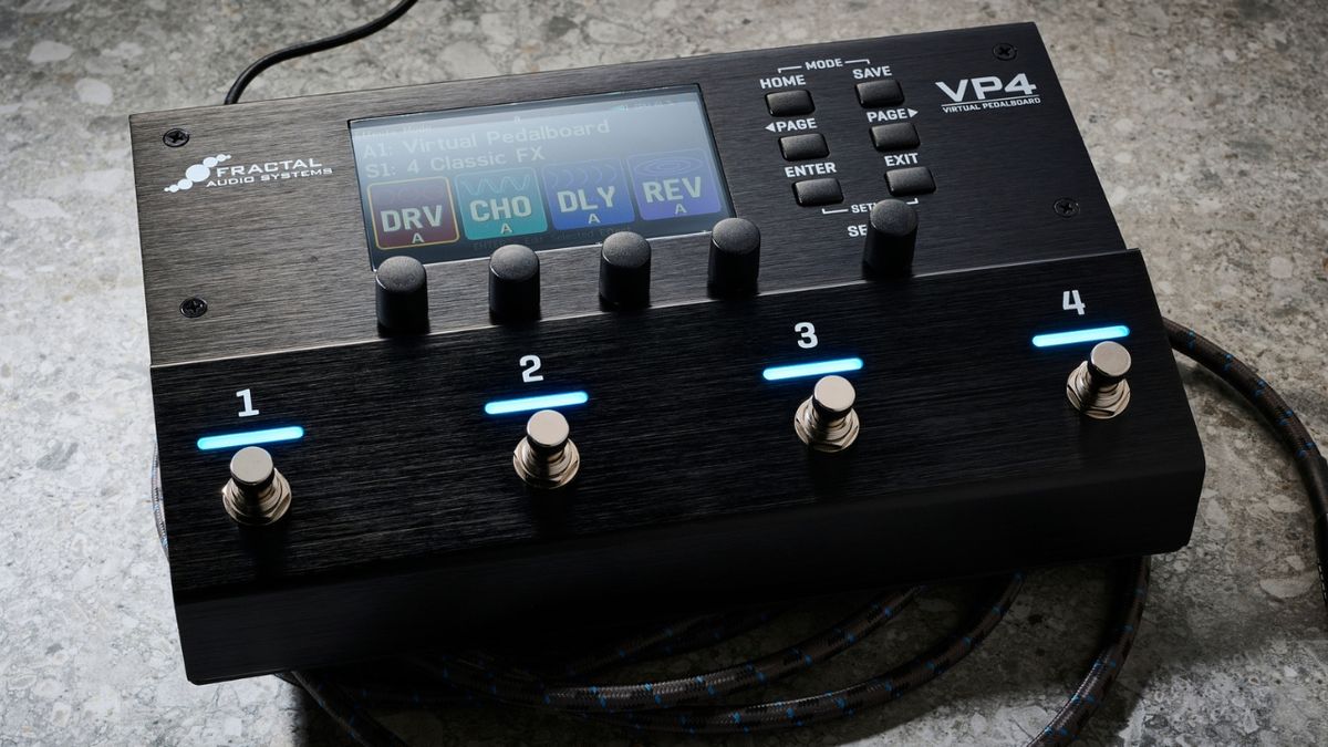 A Fractal Audio VP4 Virtual Pedalboard multi-effects pedal on a concrete floor