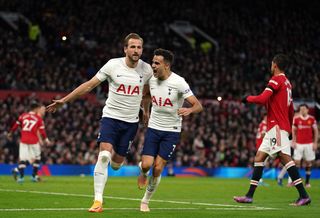 Harry Kane, celebrates scoring his 11th league goal of the season from the penalty spot in Saturday's defeat at Old Trafford