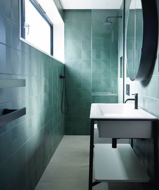 narrow bathroom ideas, green bathroom walk in shower, basin, mirror,