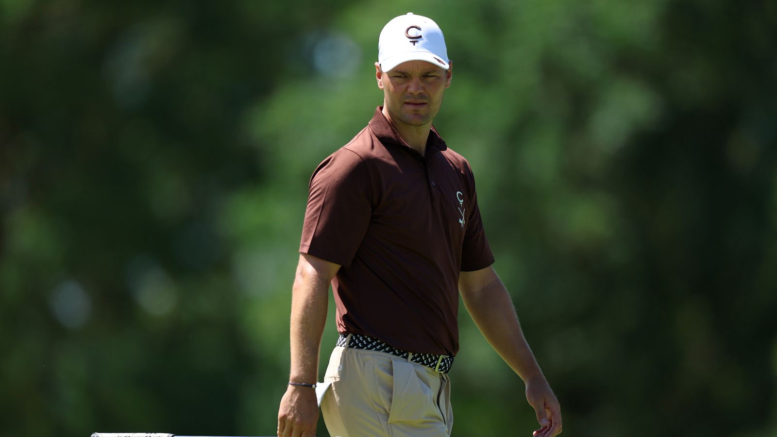Martin Kaymer walks across the green