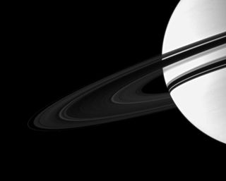 This image taken by Cassini shows the planet overexposed in order to highlight faint details of the ring system.