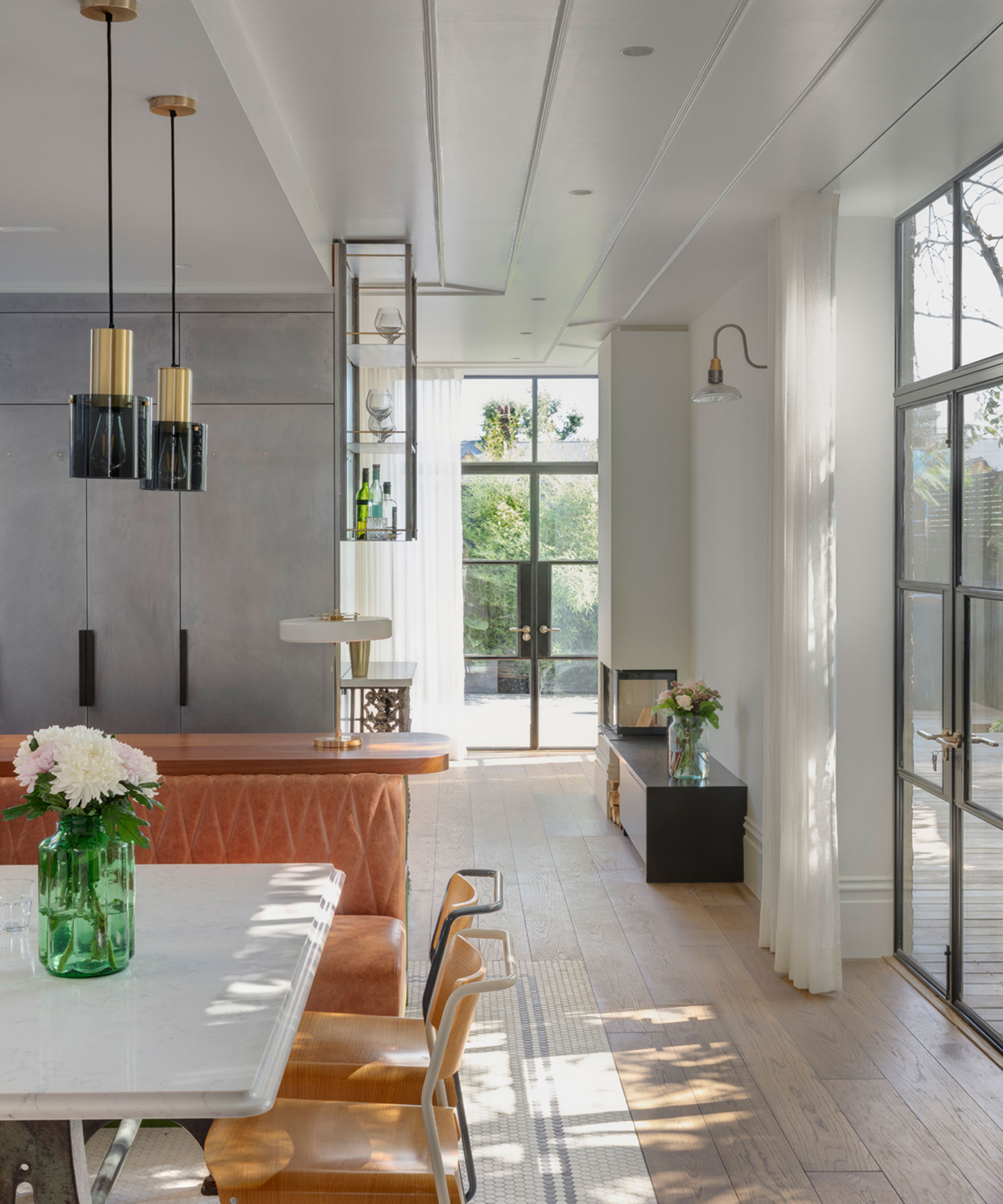 open plan dining area with full height heritage glazing