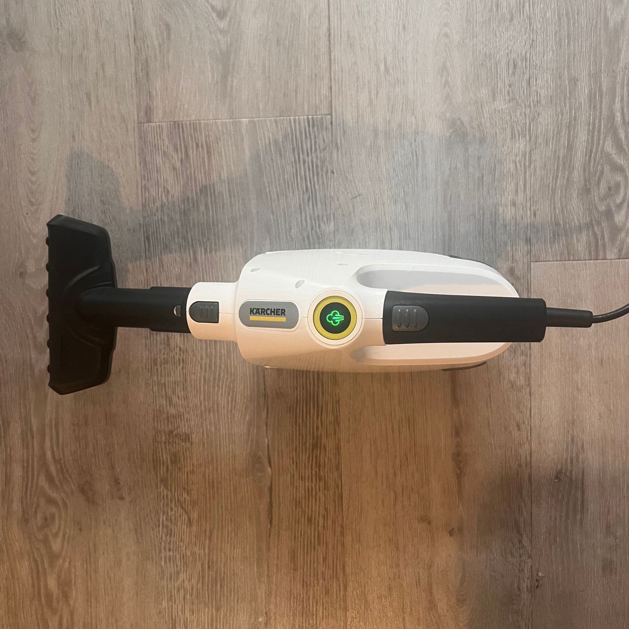 Karcher SC 1 Multi &amp; Up Extra handheld laying on the floor