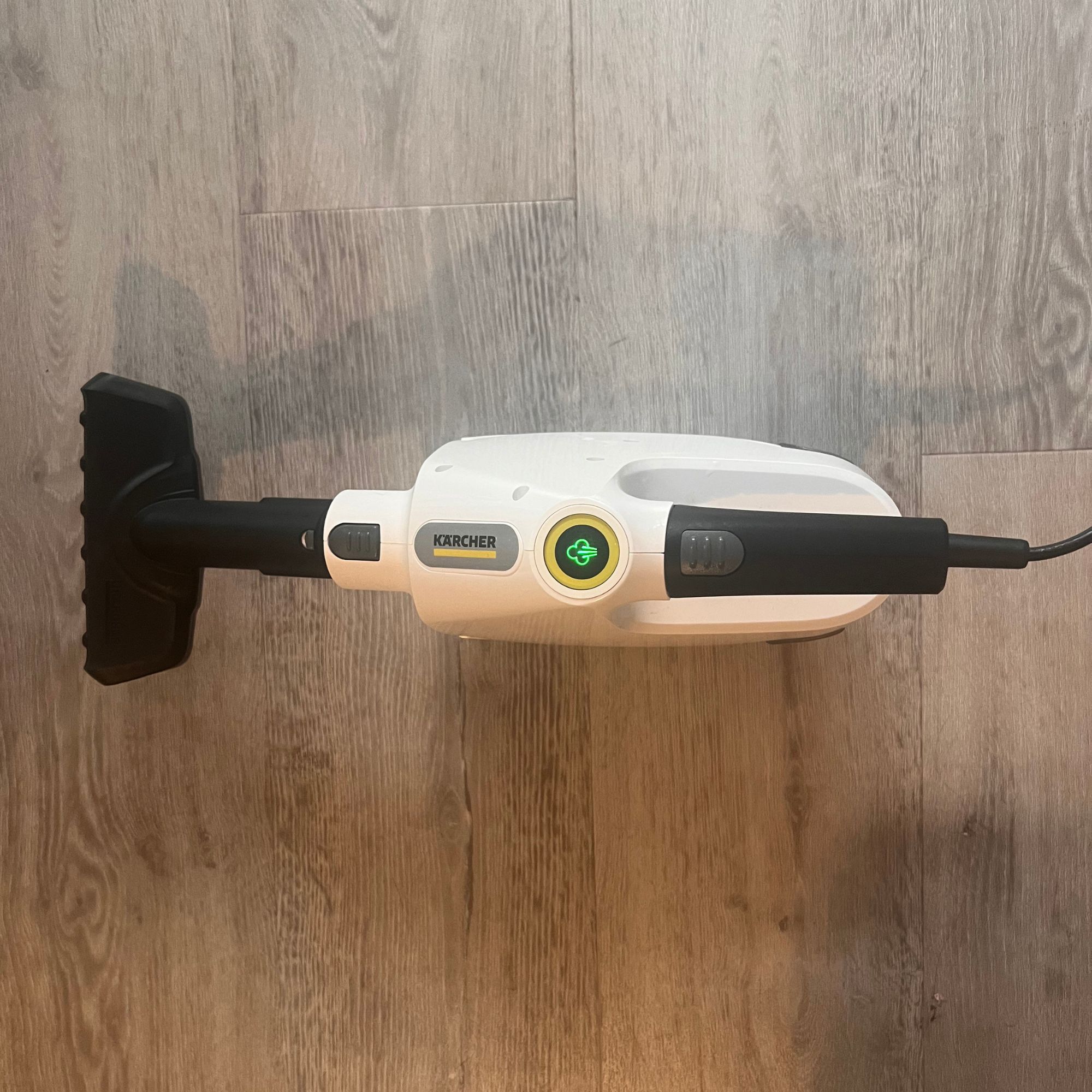 Karcher SC 1 Multi & Up Extra handheld laying on the floor