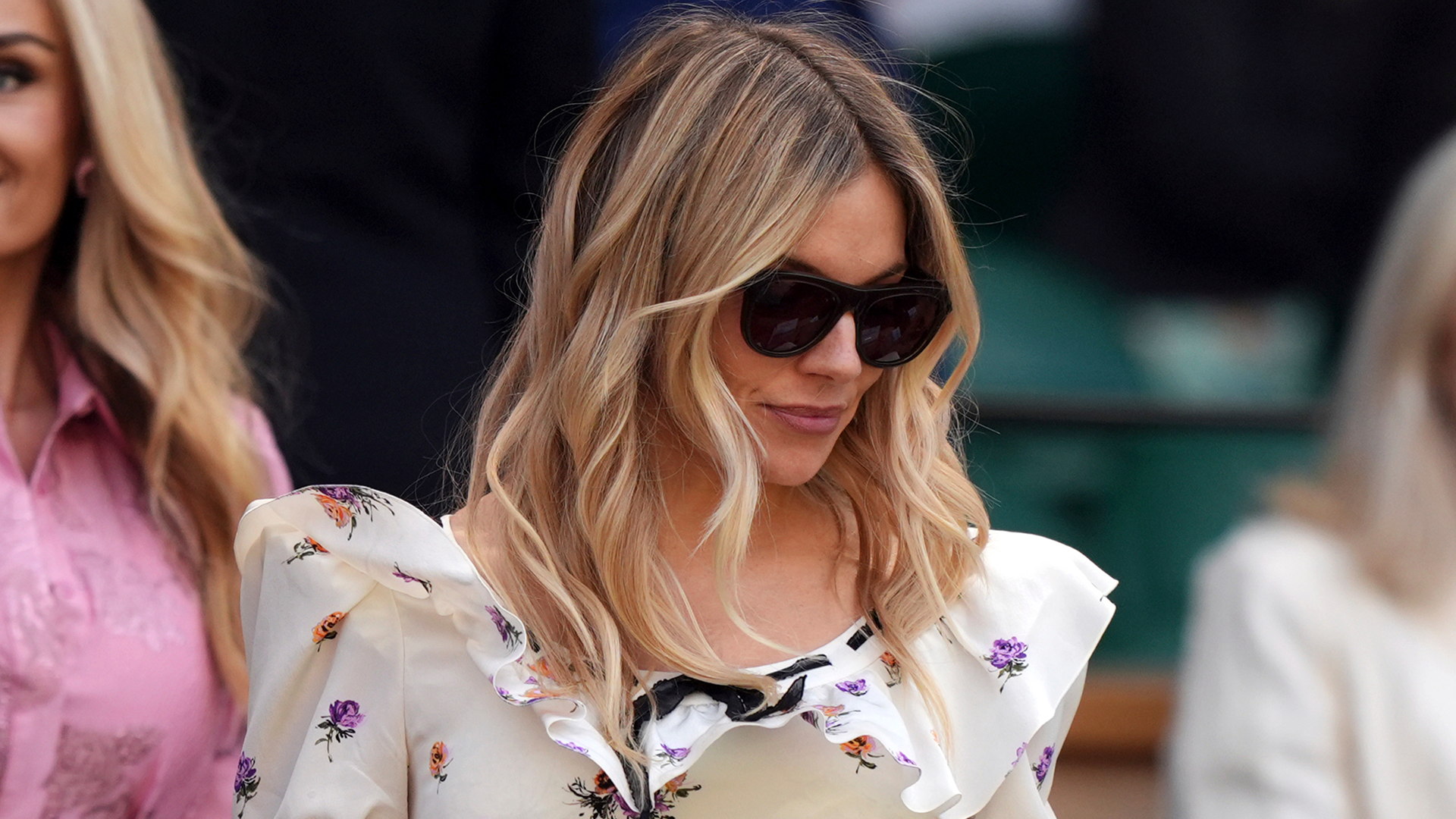 Sienna Miller attended Wimbledon 2025 in a floral little white dress from Alessandra Rich