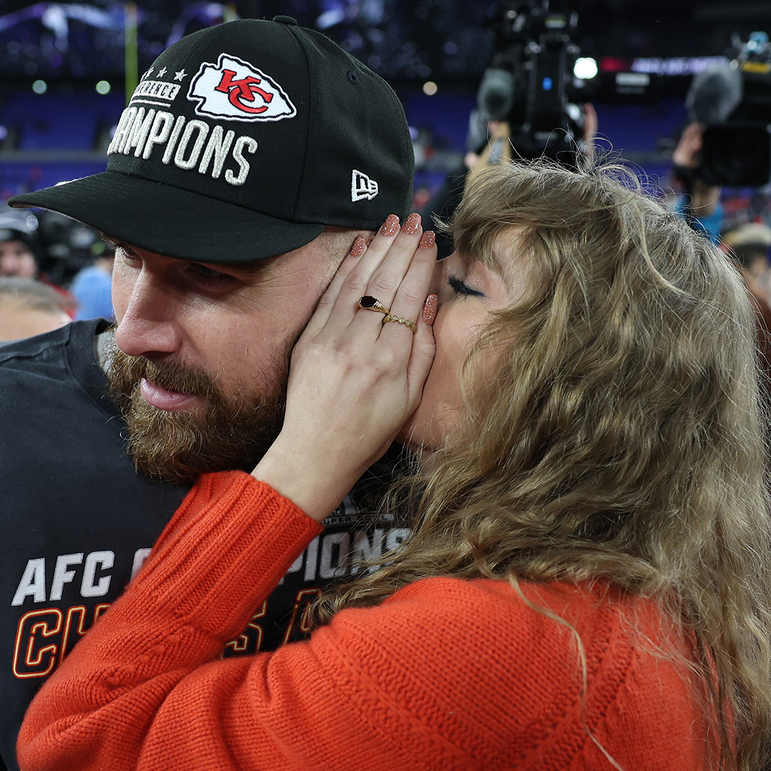 BALTIMORE, MARYLAND - JANUARY 28: Travis Kelce #87 of the Kansas City Chiefs celebrates with Taylor Swift as she whispers in his ear after a 17-10 victory against the Baltimore Ravens in the AFC Championship Game at M&amp;T Bank Stadium on January 28, 2024 in Baltimore, Maryland. (Photo by Patrick Smith/Getty Images)