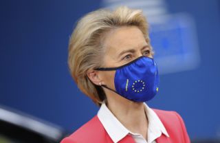European Commission President Ursula von der Leyen wearing a mask arrives on the second day of a European Union (EU) summit at The European Council Building in Brussels on October 2, 2020. -