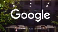 Google logo pictured above the entrance to the company's King's Cross office in London, UK.