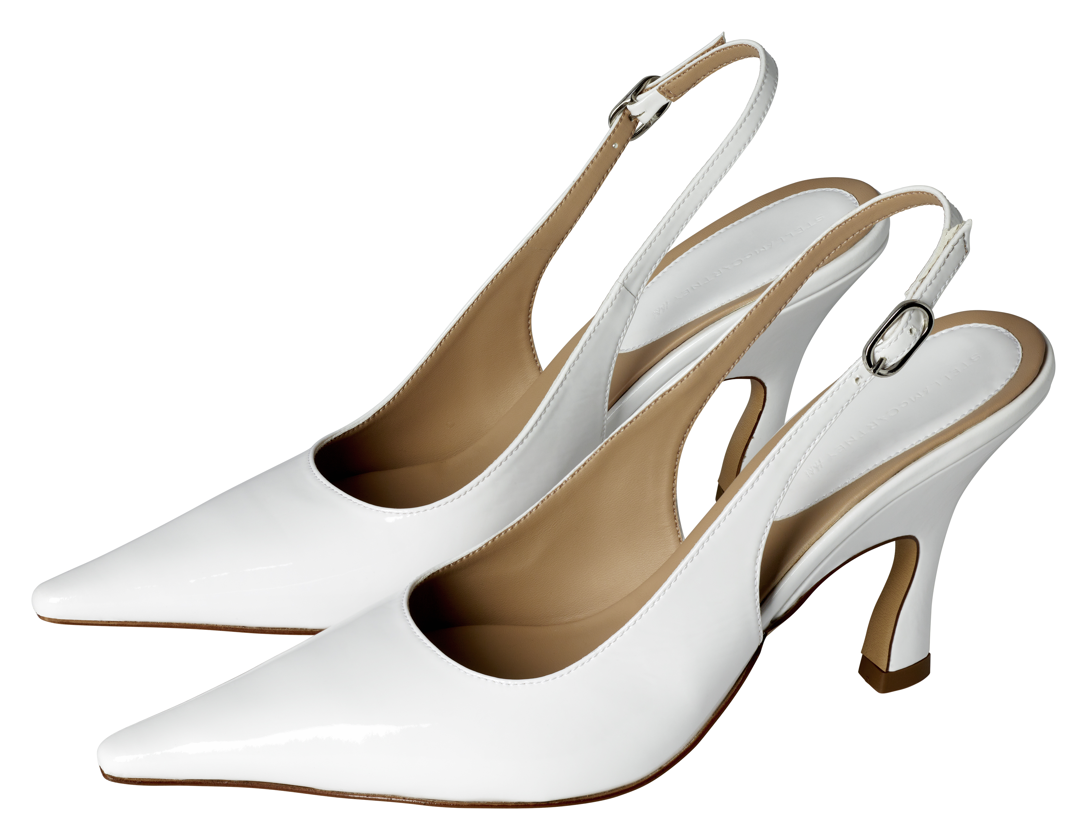 clothes from the H&M x Stella McCartney collaboration on a plain backdrop