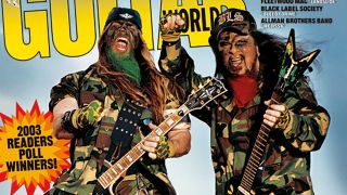 Guitar World March 2003 cover featuring Zakk Wylde and Dimebag Darrell with in full camo clothing and facepaint, with camo finish guitars and dyed beards.