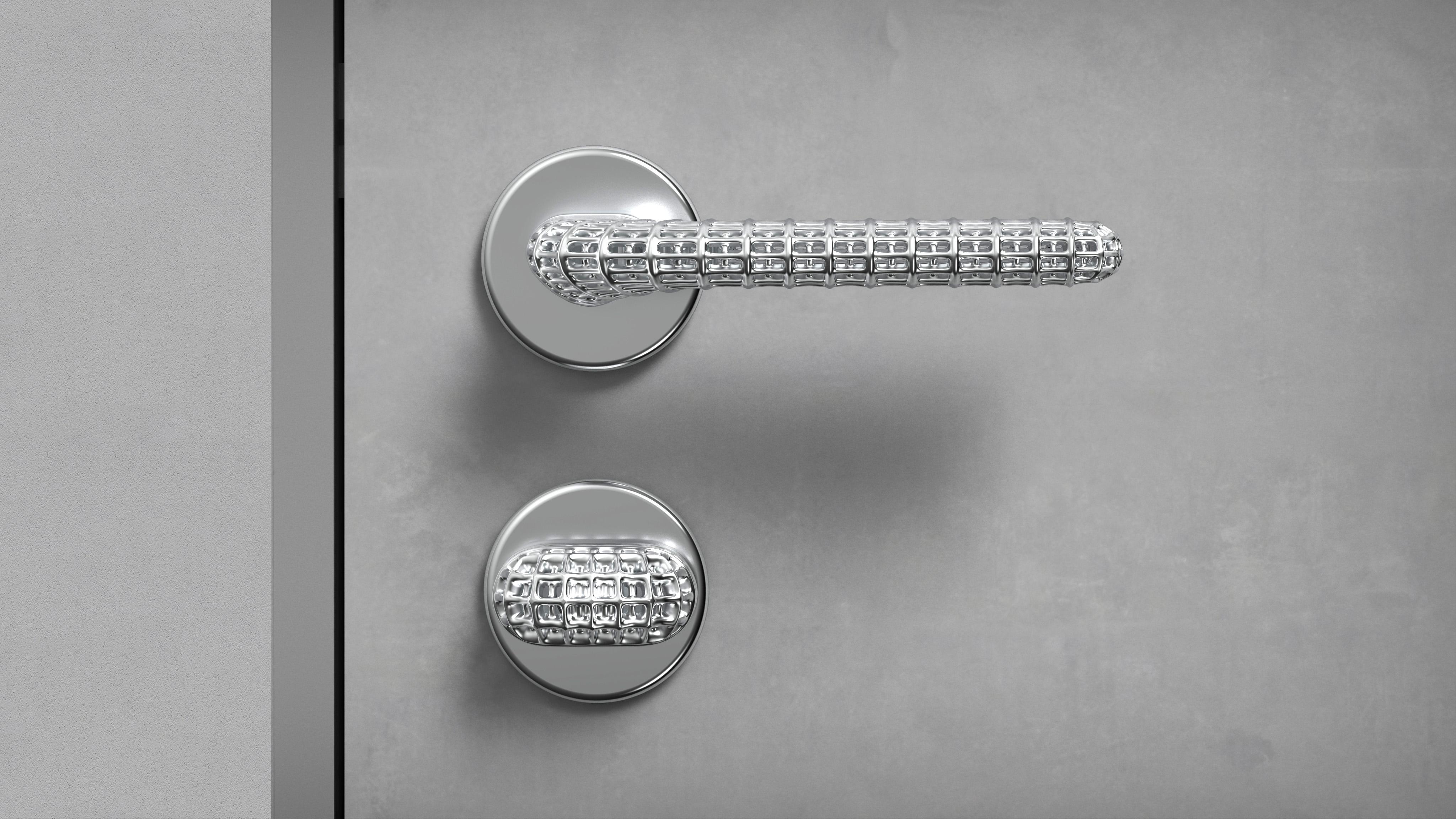 silver door handle on grey door