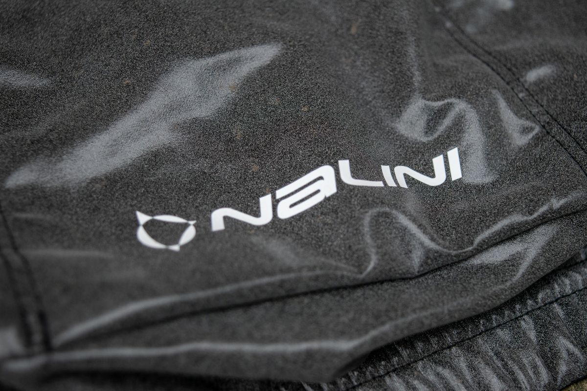 The Nalini wordmark on the bottom of the gilets middle pocket