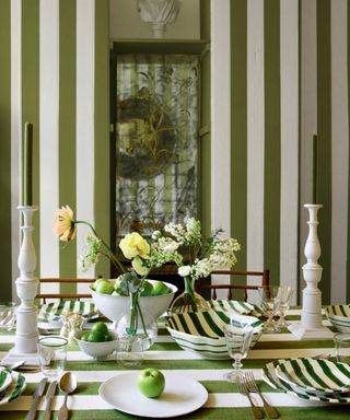 Dining room with green and white stripe wall