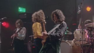 Led Zeppelin performing together in archival concert footage