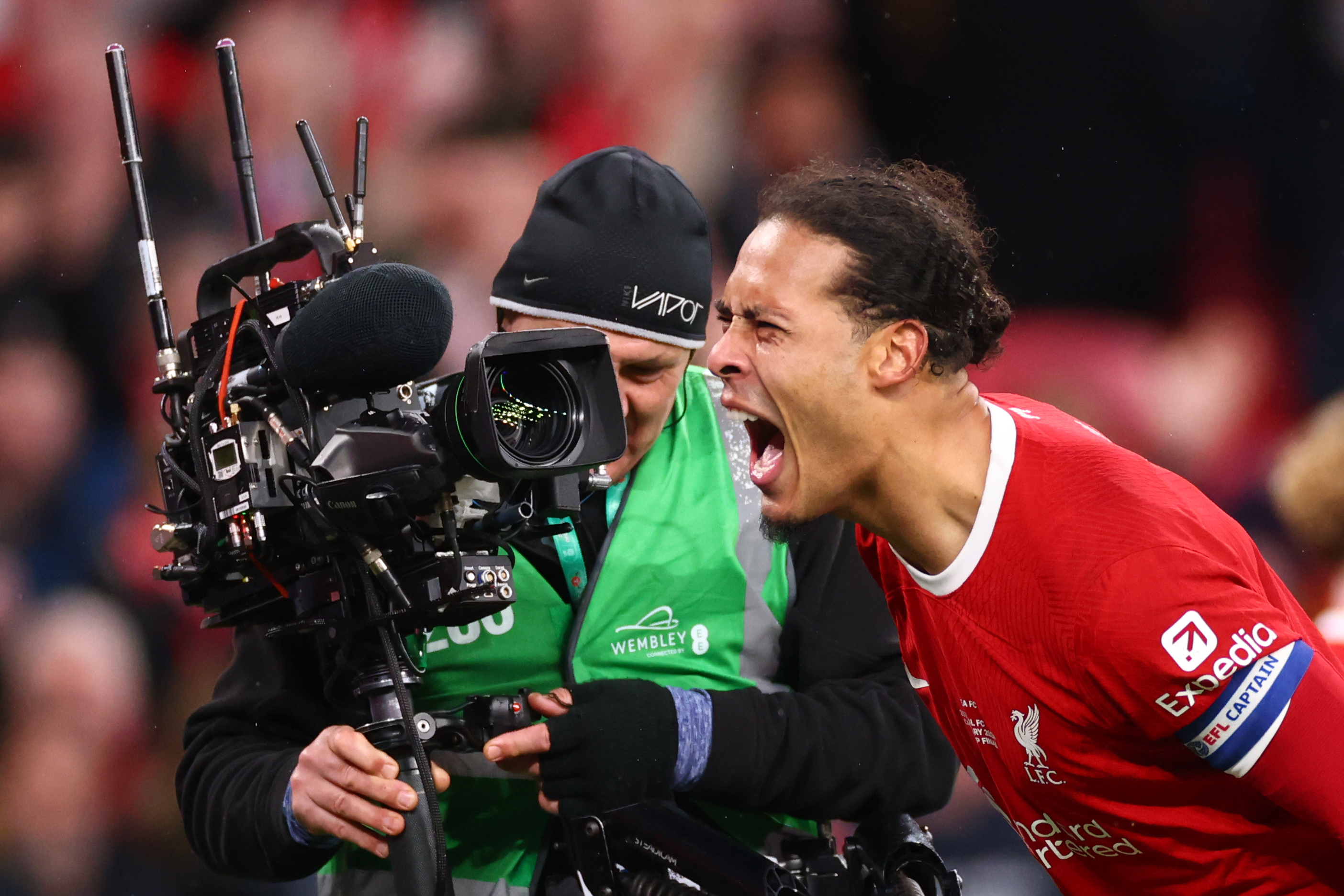 Virgil van Dijk celebrates after scoring a late winner in extra time for Liverpool against Chelsea in the 2024 League Cup final.