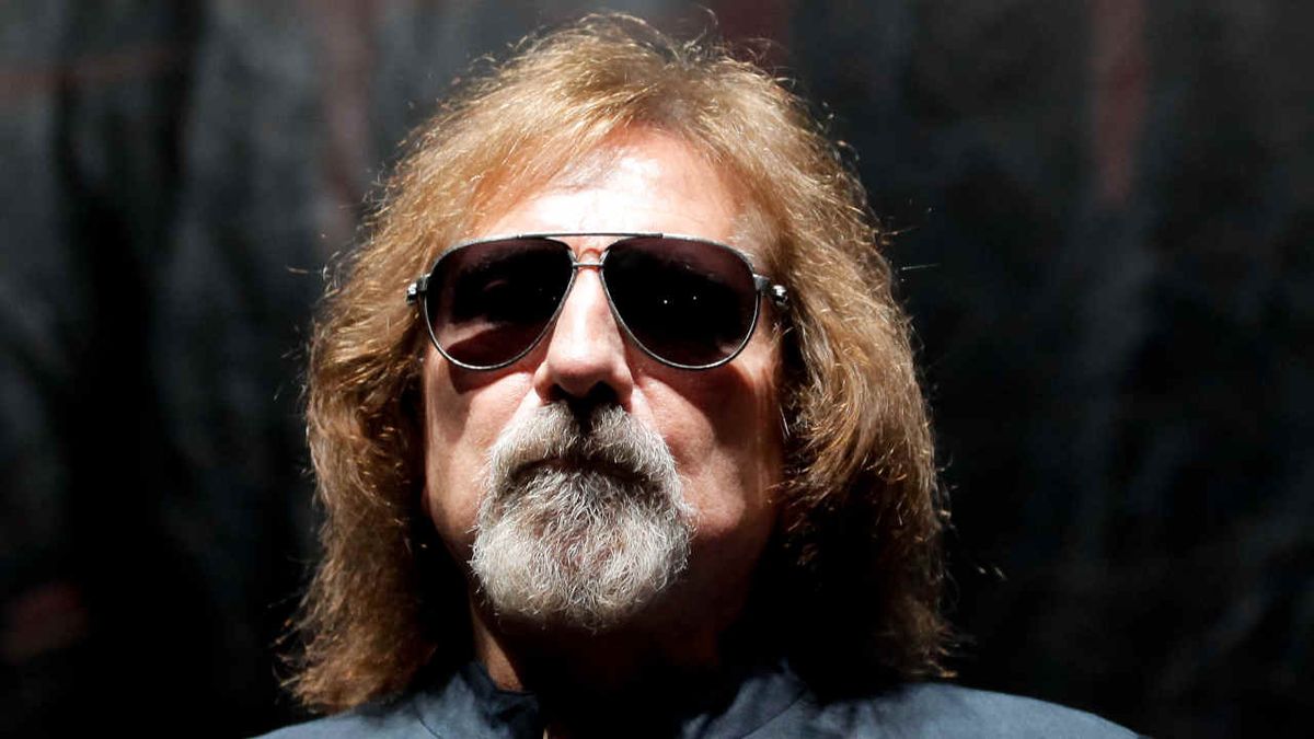 Geezer Butler wearing sunglasses