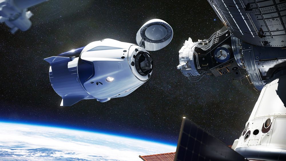 Crew-1&#039;s Dragon capsule docks with the International Space Station.