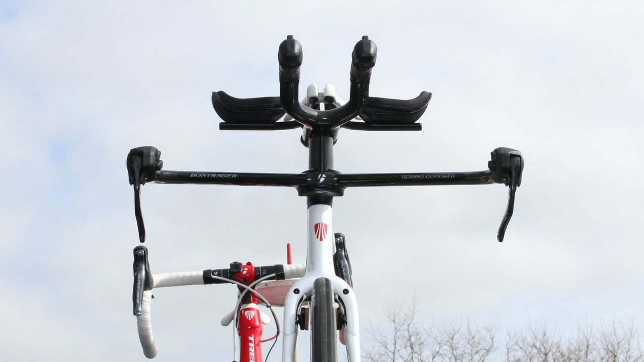 Trek's Speed Concept bars offer exceptionally low frontal profile, while Shimano Di2 means shifting isn't at all compromised. (Tight bends on internally routed mechanical cables often wreak havoc on shifting performance due to increased friction).