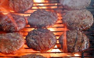 hamburgers on the grill.
