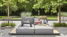 Outdoor day beds pictured poolside