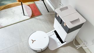 Ecovacs Deebot T50 Max Pro Omni robot coming out of its base station