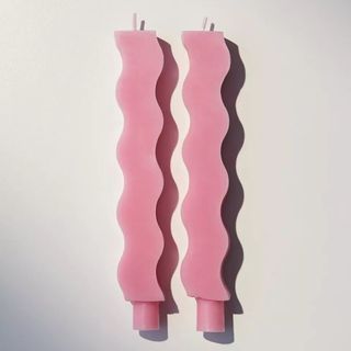 Wave taper pink candles from Urban Outfitters