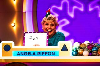 Angela Rippon's got her Christmas party hat on for 'Blankety Blank'.