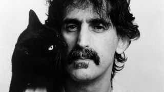 a portrait of frank zappa with a cat