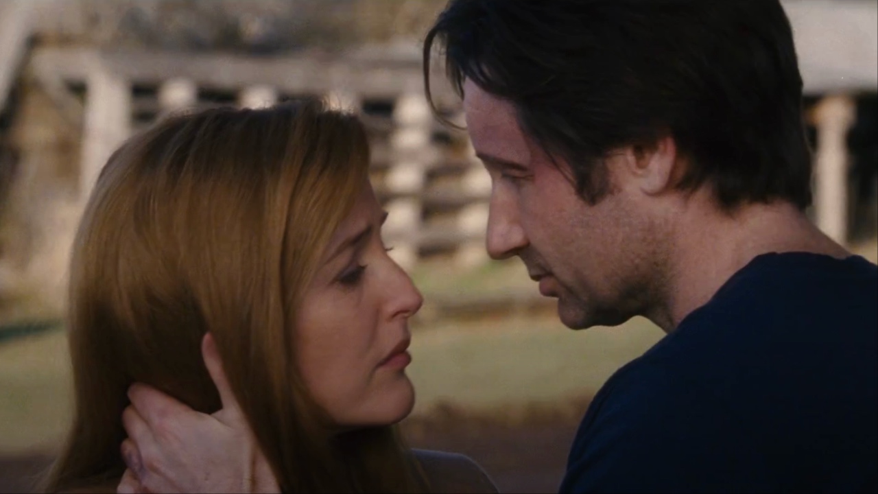 Scully and Mulder about to kiss in The X-Files: I Want to Believe trailer screenshot