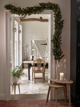 Hallway decorating with garland by The White Company