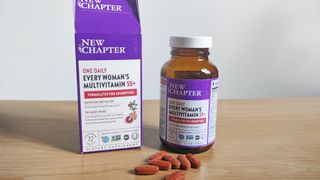 Container of New Chapter One Daily Every Women's Multivitamin 55+ on a table