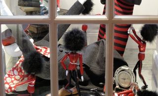 Handpainted guards make for a very British Gulliver's Travels-themed window display