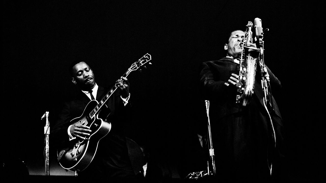 John Coltrane with Wes Montgomery photographed at The Monterey Jazz Festival in Monterey, CA September 24, 1961 &copy; Jim Marshall Photography LLC.