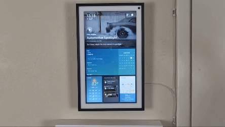 An Echo Show 15 switching from portrait to landscape mode thanks to a rotating wall mount